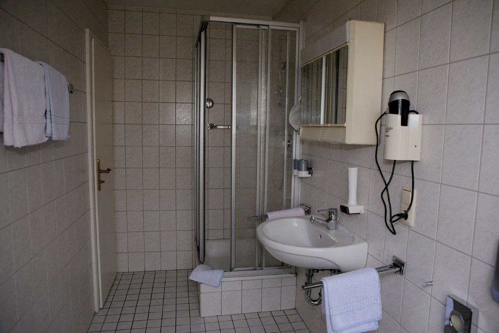 shower, free toiletries, hair dryer, slippers