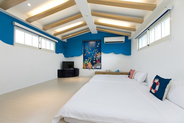 A bedroom with a large bed, a TV, and a painting on the wall. - Together B&B (Sanxing)