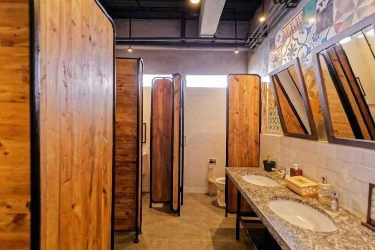 Bathroom | Eco-friendly toiletries, hair dryer, bathrobes, slippers