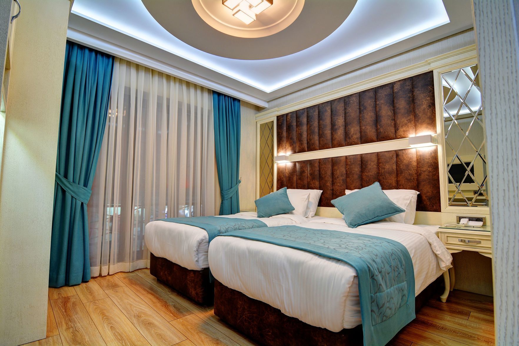 Premium bedding, in-room safe, laptop workspace, soundproofing
