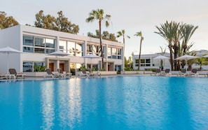 Outdoor pool, pool umbrellas, pool loungers
