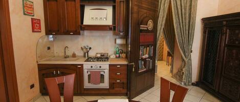 Apartment, 2 Bedrooms | Private kitchenette | Full-size fridge, stovetop, cookware/dishes/utensils