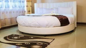 Chambre Simple Exécutive, 1 grand lit | Bureau, rideaux occultants, chambres insonorisées