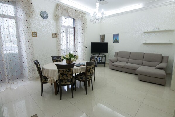 Apartment, 2 Bedrooms | Living area | Flat-screen TV