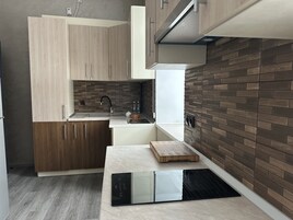 Suite familiar | Cocina privada | Hervidor eléctrico y papel de cocina