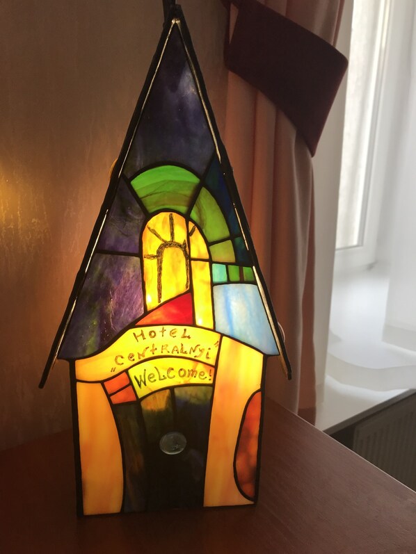 A stained glass decoration with the text "Hotel Centralny Welcome!" - Hotel Centralnyi (Poltava)