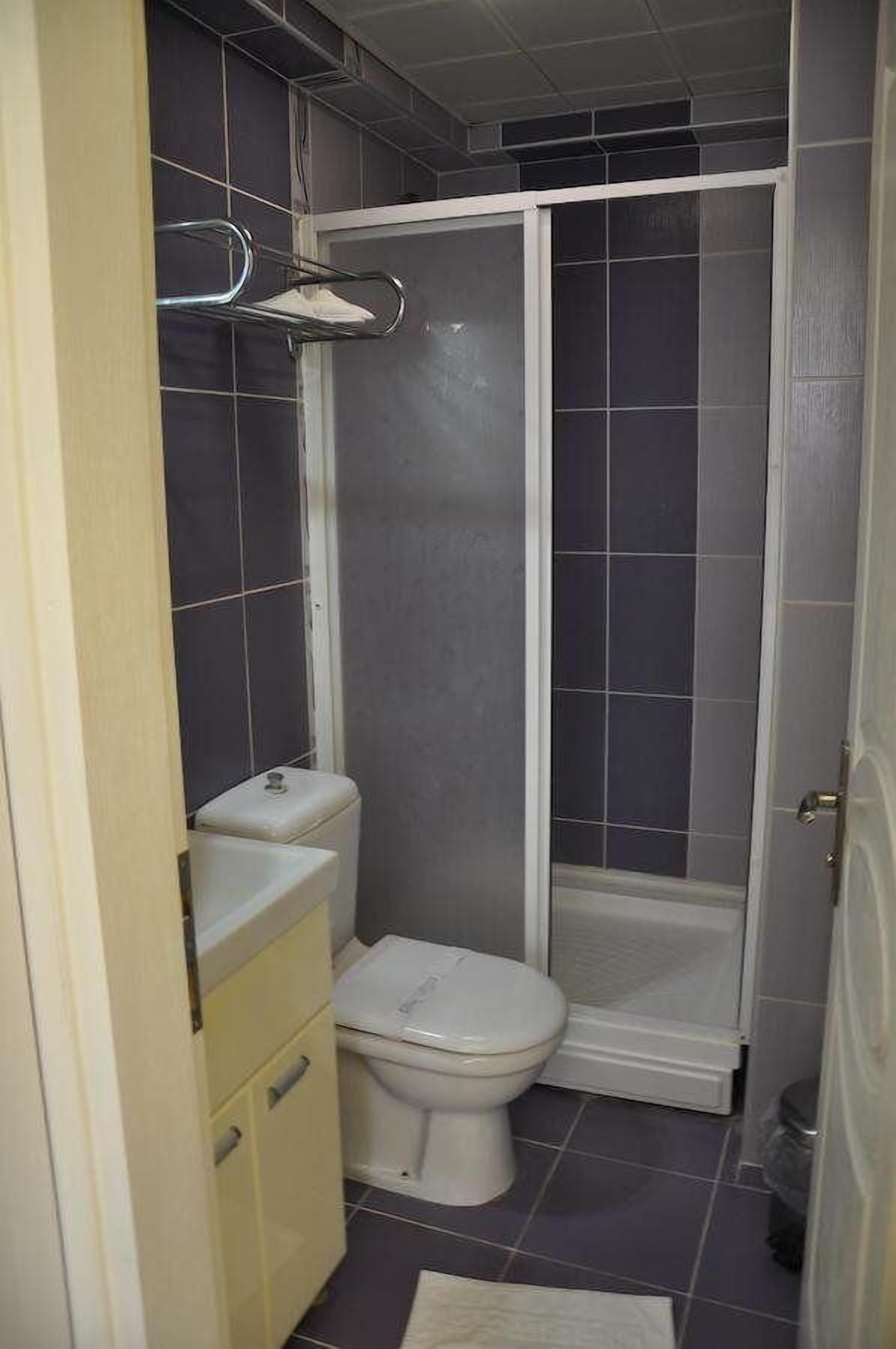 shower, free toiletries, hair dryer, slippers