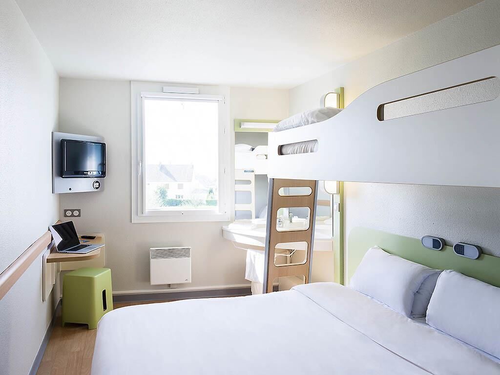Quarto triplo, várias camas | Escrivaninha, quartos à prova de som, Wi-Fi de cortesia, roupa de cama