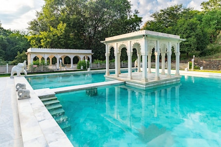 Outdoor pool. The Fern Bambora Fort Udaipur, Bambora, Series by Marriott