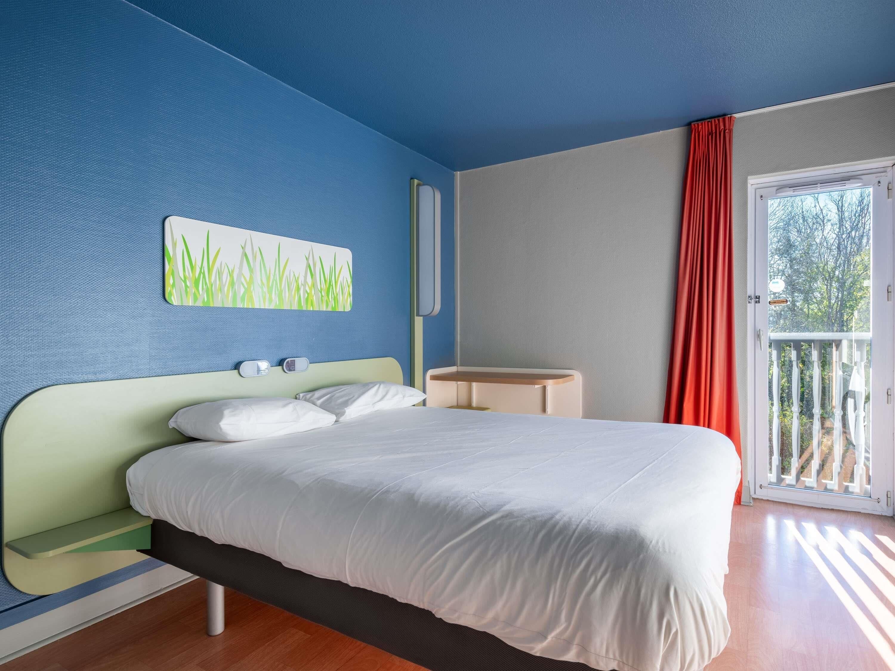 Habitación doble | Escritorio, cunas gratuitas, wifi gratis y ropa de cama 