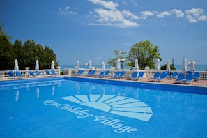 Outdoor pool, pool umbrellas, pool loungers