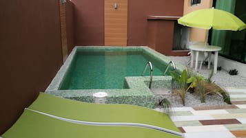 Outdoor pool, pool umbrellas, sun loungers
