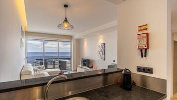 Panoramic Apartment, 1 Bedroom, Lanai, Sea View | Private kitchen | Full-sized fridge, microwave, oven, stovetop