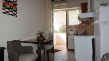 Apartment, 1 Bedroom | Private kitchen | Full-sized fridge, oven, stovetop, cookware/dishes/utensils