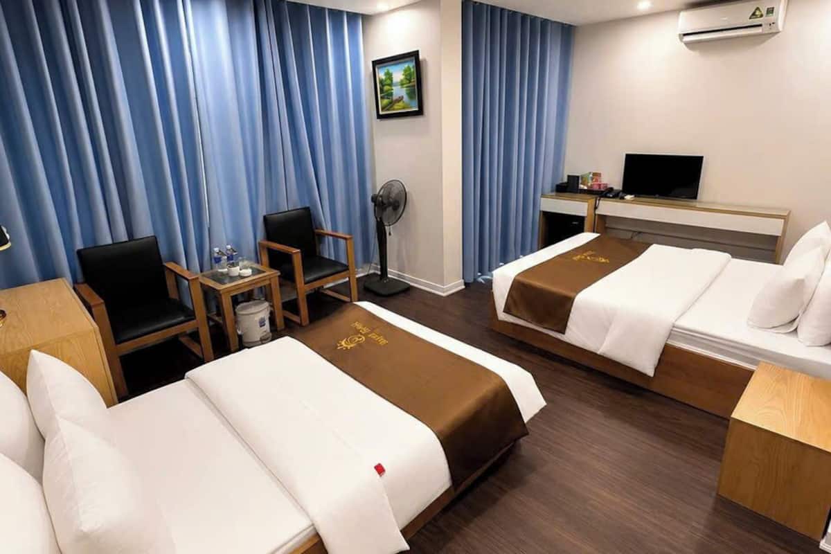 Family Triple Room | Living area | Flat-screen TV