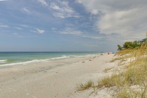 A beach with clear skies, calm waters, and sparse vegetation. - 350 Ft to Beach! 'Lizard Lair' in Indian Rocks (Indian Rocks Beach)