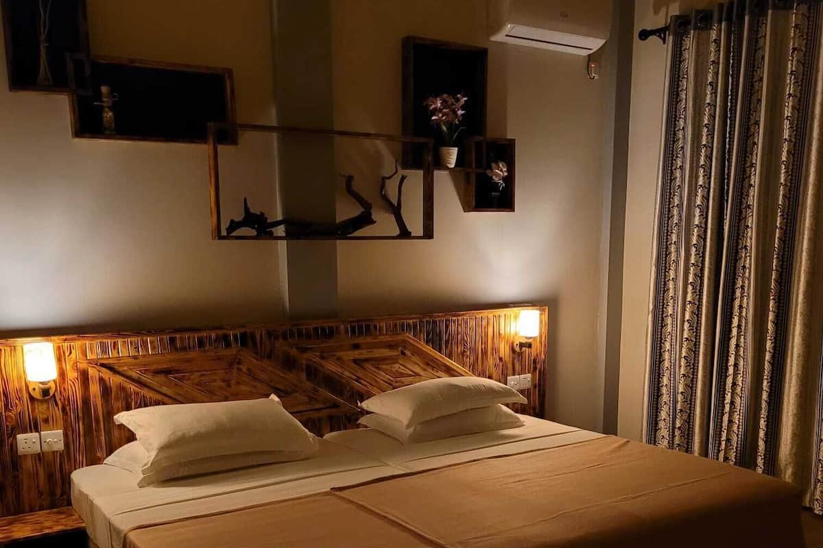 Standaard tweepersoonskamer, uitzicht op tuin | 1 slaapkamer, luxe beddengoed, een minibar, een kluis op de kamer