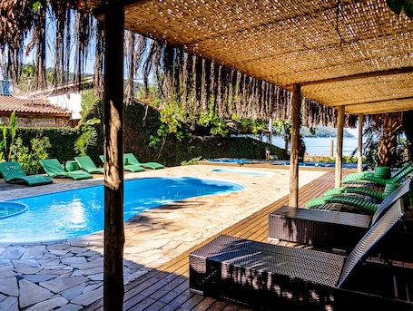 Outdoor pool, pool umbrellas, sun loungers