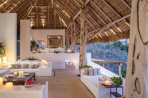 Casa Selva, Ocean view villa | Living area | 36-inch flat-screen TV with cable channels, TV - Private Villas in Careyes (Costa Careyes)