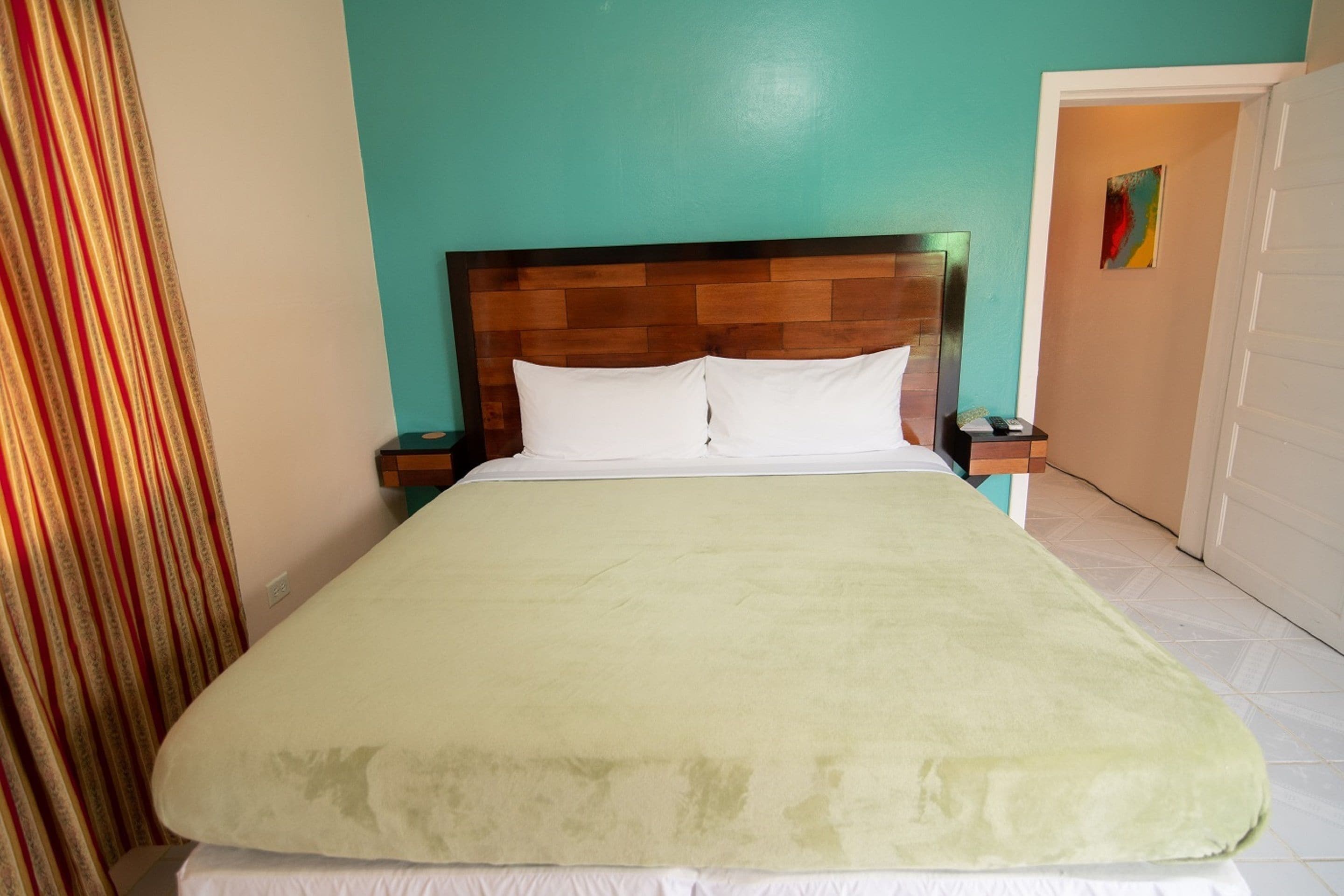 deluxe apartment, 1 king bed, non smoking, kitchen | 1 bedroom, desk, laptop workspace, blackout curtains