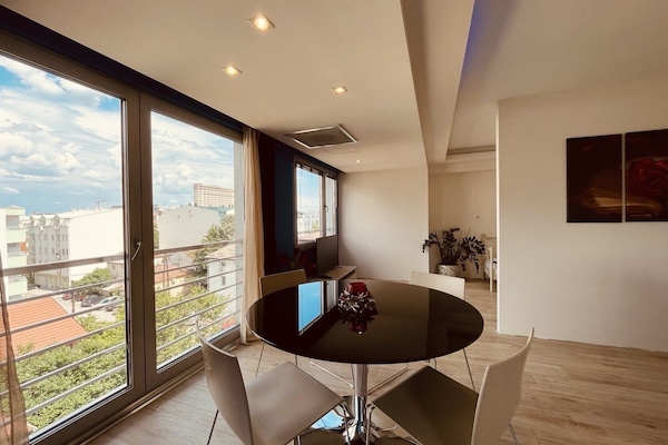 Exclusive Apartment, 2 Bedrooms, Balcony | Living area | Flat-screen TV