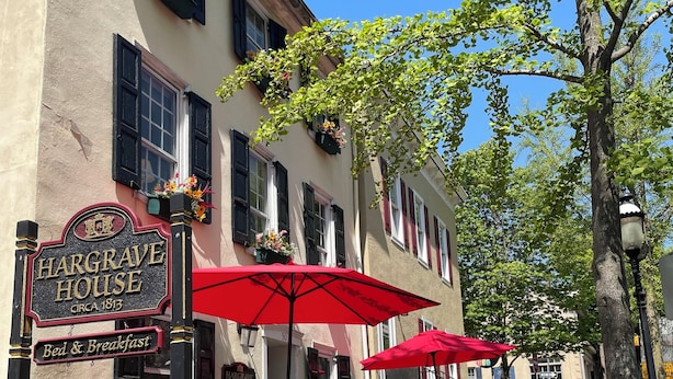 A building with a sign reading "Hargrove House Bed & Breakfast" and an "Entrance" sign pointing left. - Hargrave House B & B (Doylestown)