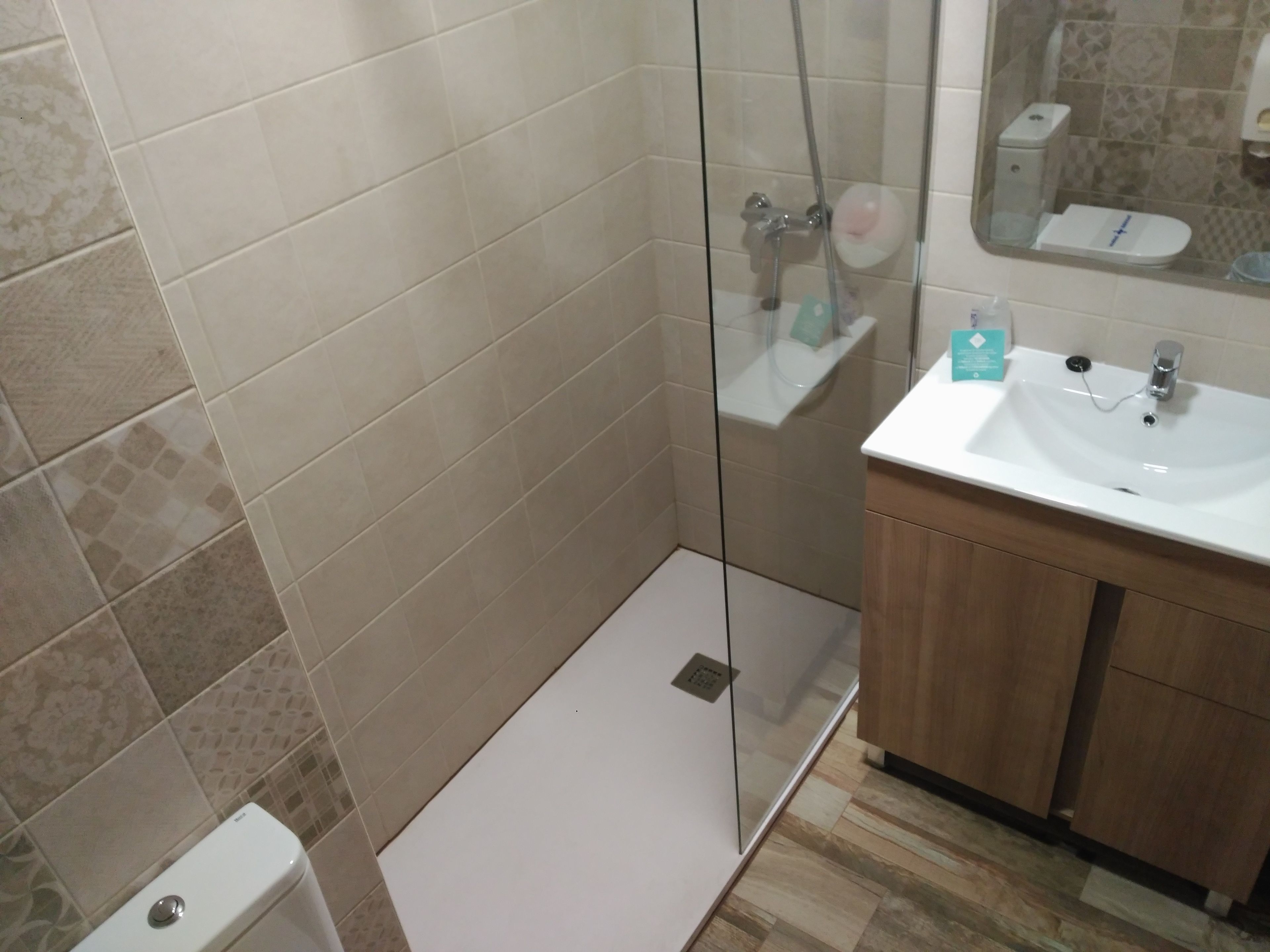 family room | bathroom | shower, free toiletries, hair dryer, towels
