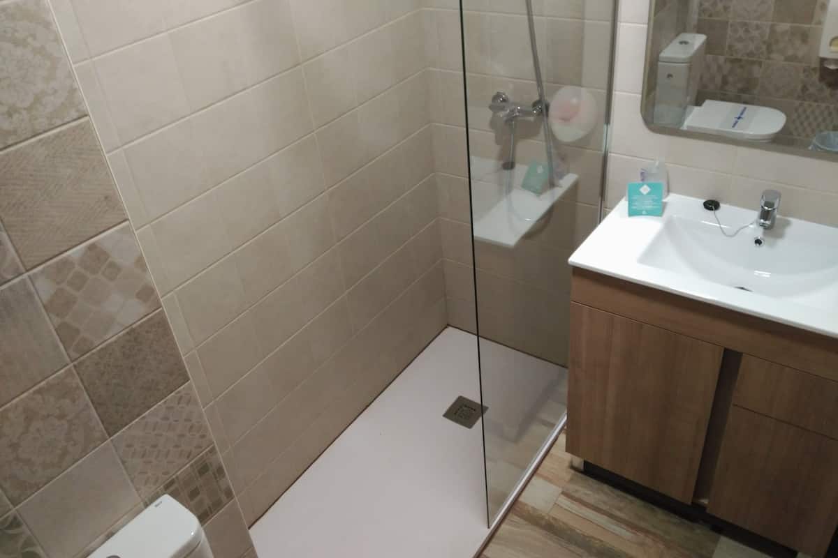 family room | bathroom | shower, free toiletries, hair dryer, towels