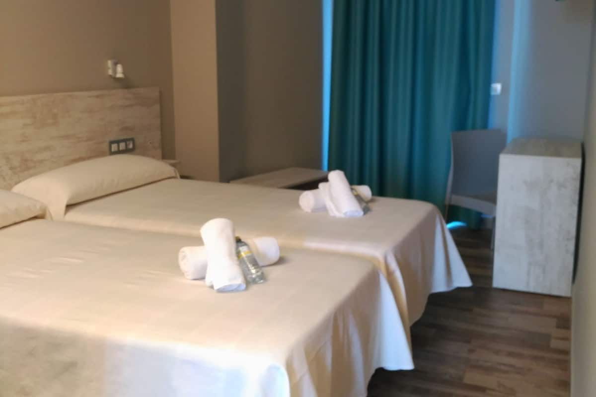 desk, blackout curtains, soundproofing, iron/ironing board