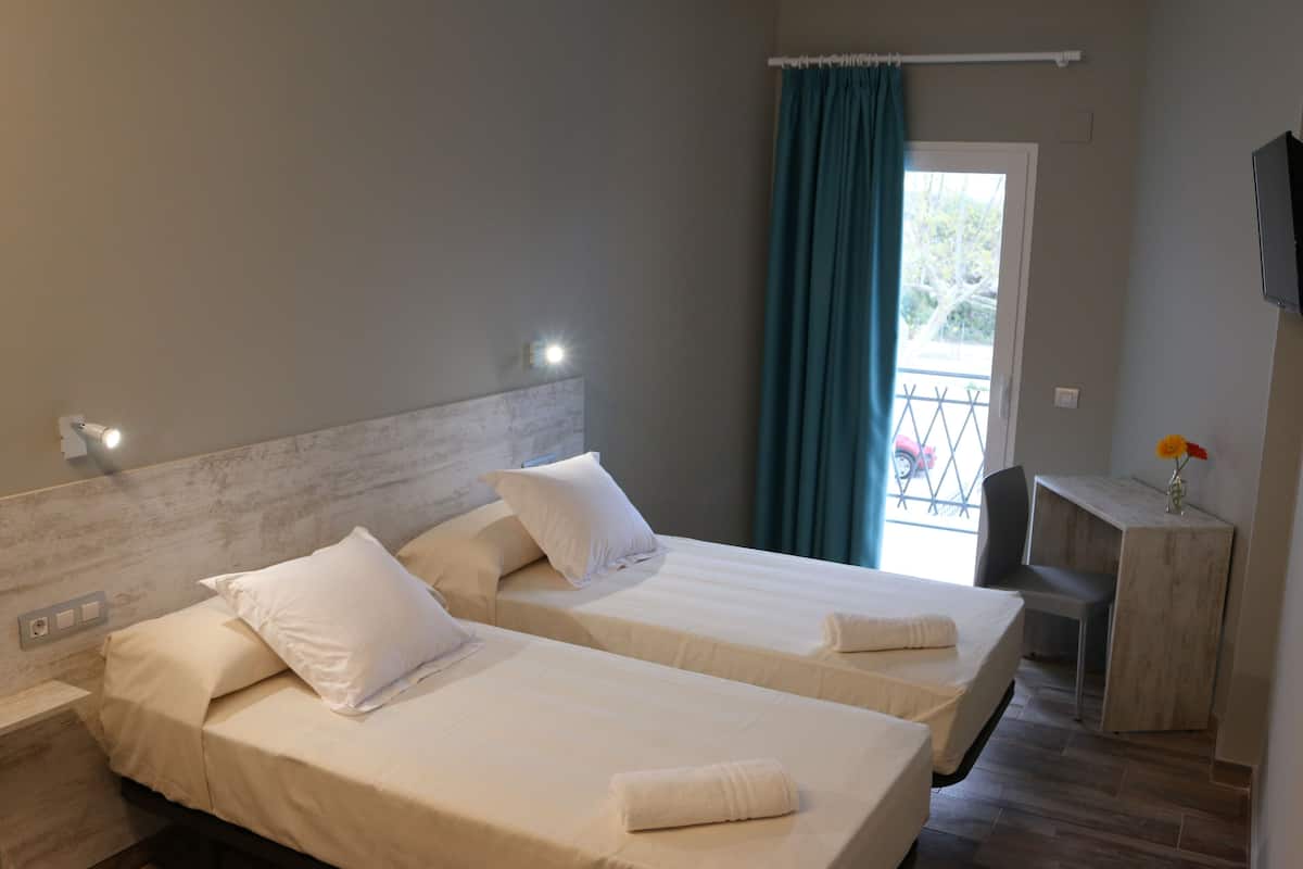 twin room | desk, blackout curtains, soundproofing, iron/ironing board