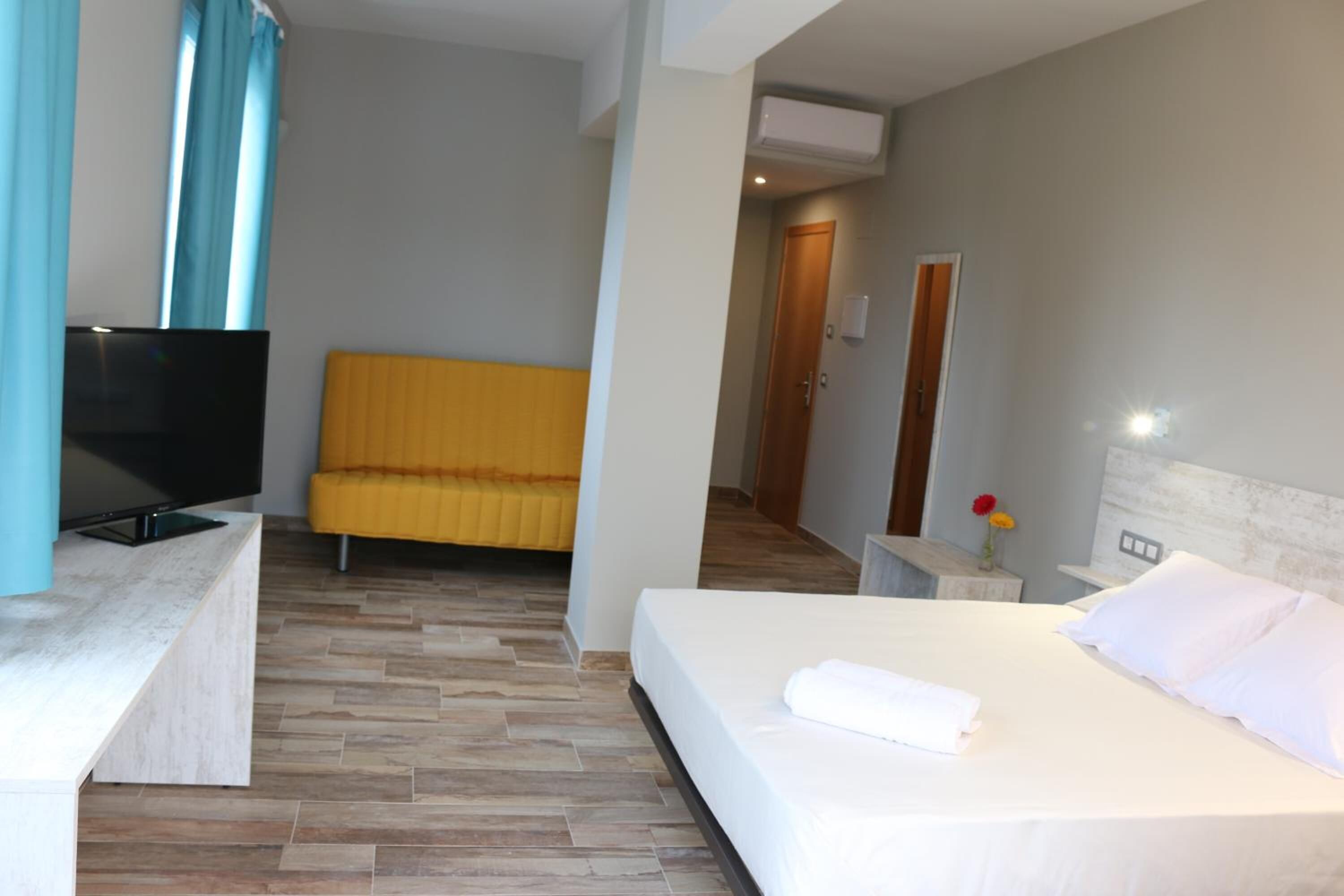 desk, blackout curtains, soundproofing, iron/ironing board