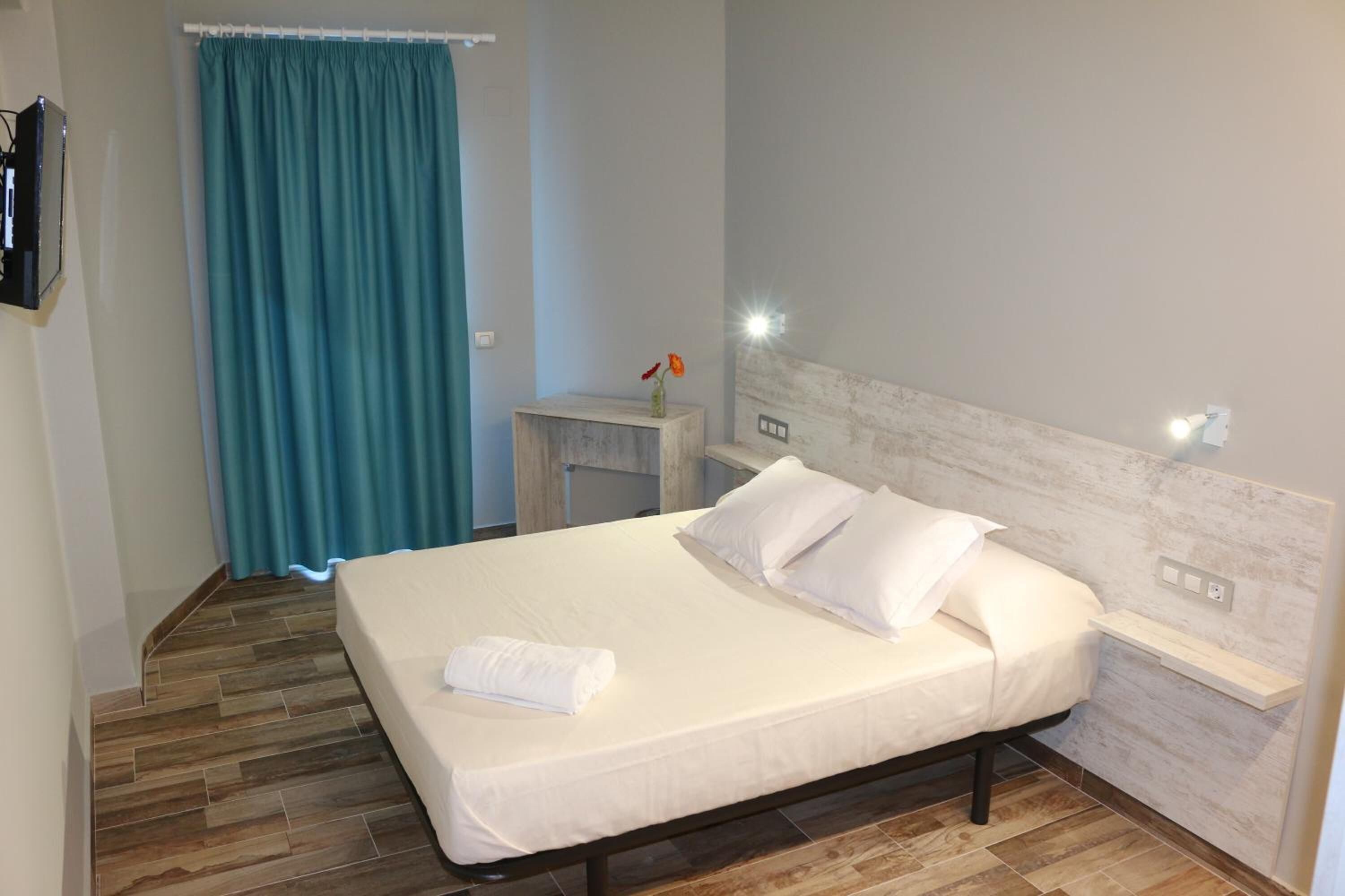 desk, blackout curtains, soundproofing, iron/ironing board