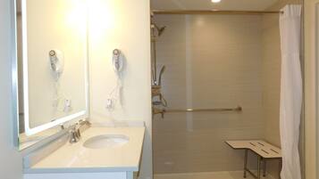Room, 1 King Bed, Mobility Accessible, Non Smoking (Roll-in Shower) | Bathroom | Free toiletries, hair dryer, towels