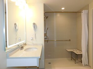 Room, 1 King Bed, Mobility Accessible, Non Smoking (Roll-in Shower) | Bathroom | Free toiletries, hair dryer, towels