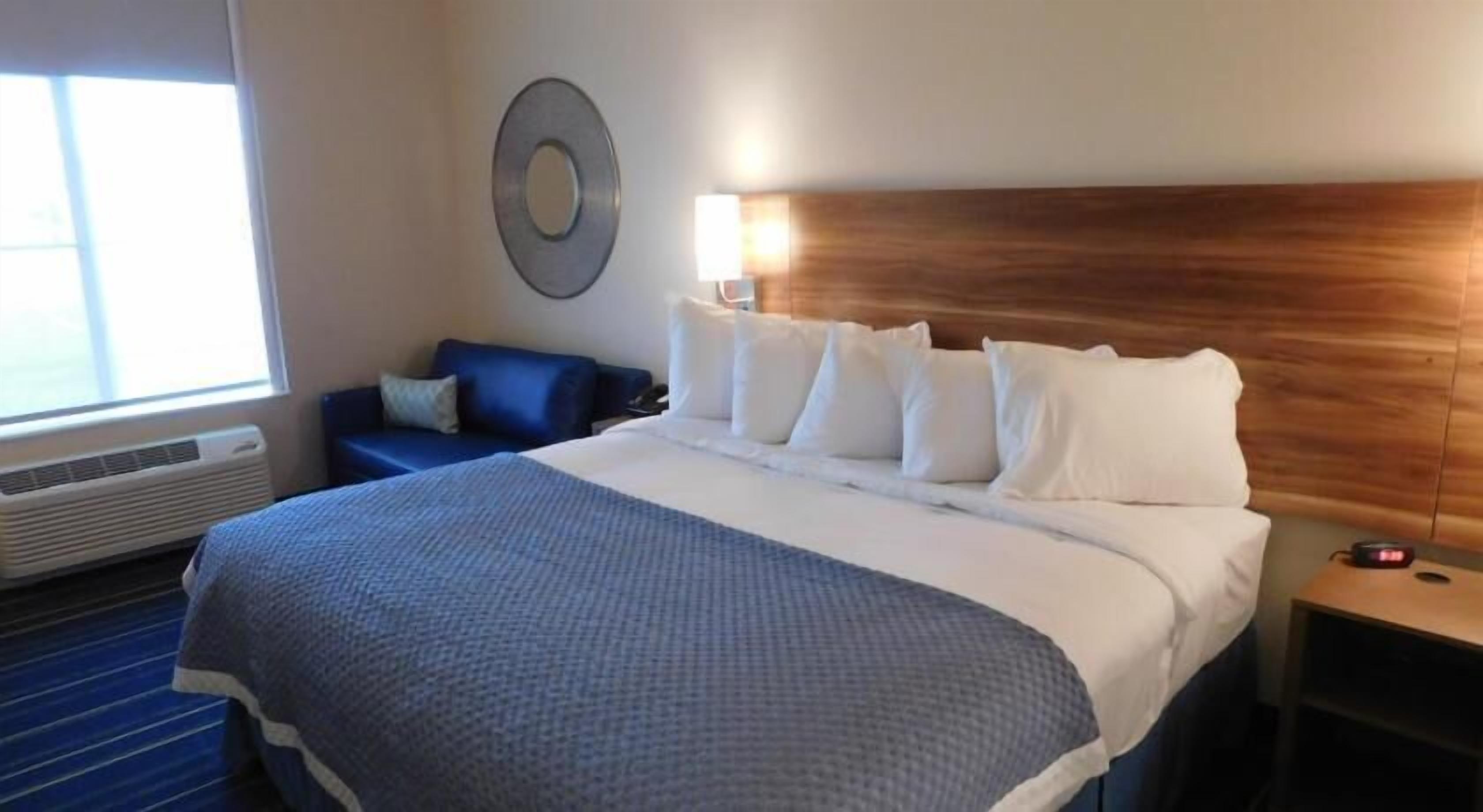 Pillowtop beds, desk, blackout drapes, iron/ironing board
