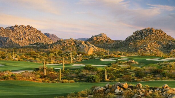 A desert golf course with rocky terrain and cacti, surrounded by mountains. - Great Location, Quiet, Beautiful and Comfortable Scottsdale Retreat (Scottsdale)