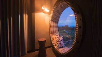 One Bedroom Duplex | Living area | Flat-screen TV