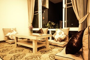 2 Bedroom Town House | Living area | 40-inch flat-screen TV with cable channels, TV