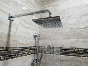 Combined shower/tub, hair dryer, towels, soap