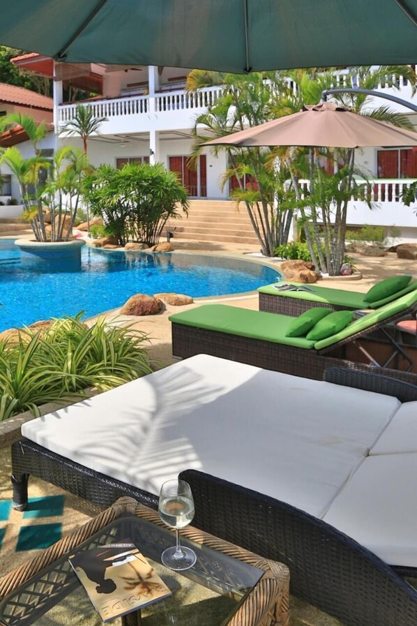 Outdoor pool, pool umbrellas, pool loungers