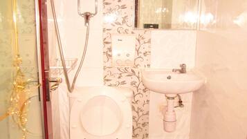 Shower, free toiletries, hair dryer, towels