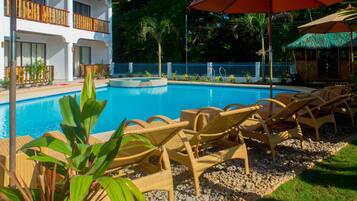 Outdoor pool, open 7 AM to 10 PM, pool umbrellas, sun loungers