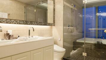 Premier Apartment with Sea View | Bathroom | Separate tub and shower, free toiletries, hair dryer, bathrobes