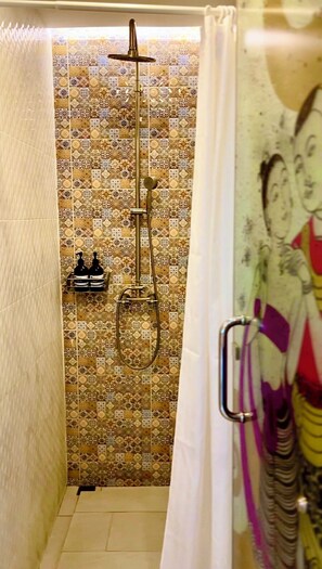 Shower, free toiletries, hair dryer, slippers