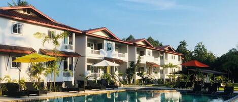 Outdoor pool, open 6:30 AM to 6:30 PM, pool umbrellas, pool loungers