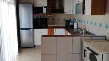 Apartemen Keluarga, 2 kamar tidur | Area keluarga | TV LCD