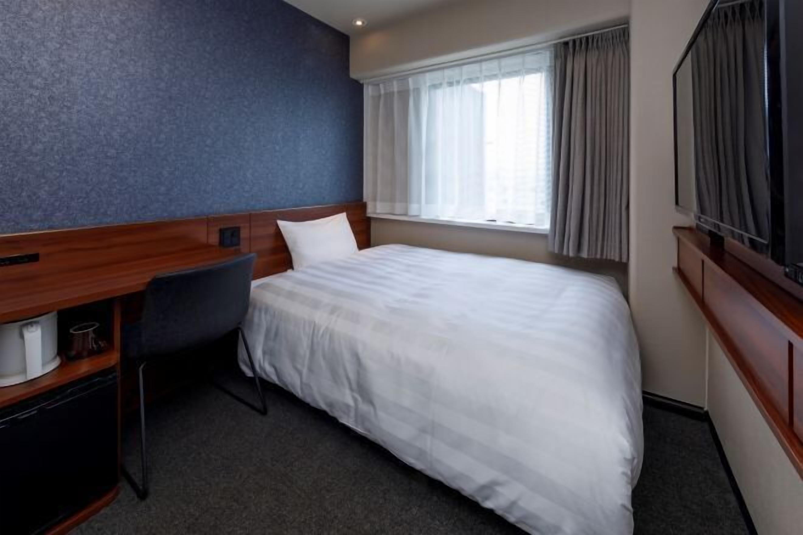 Down comforters, in-room safe, iron/ironing board, free WiFi