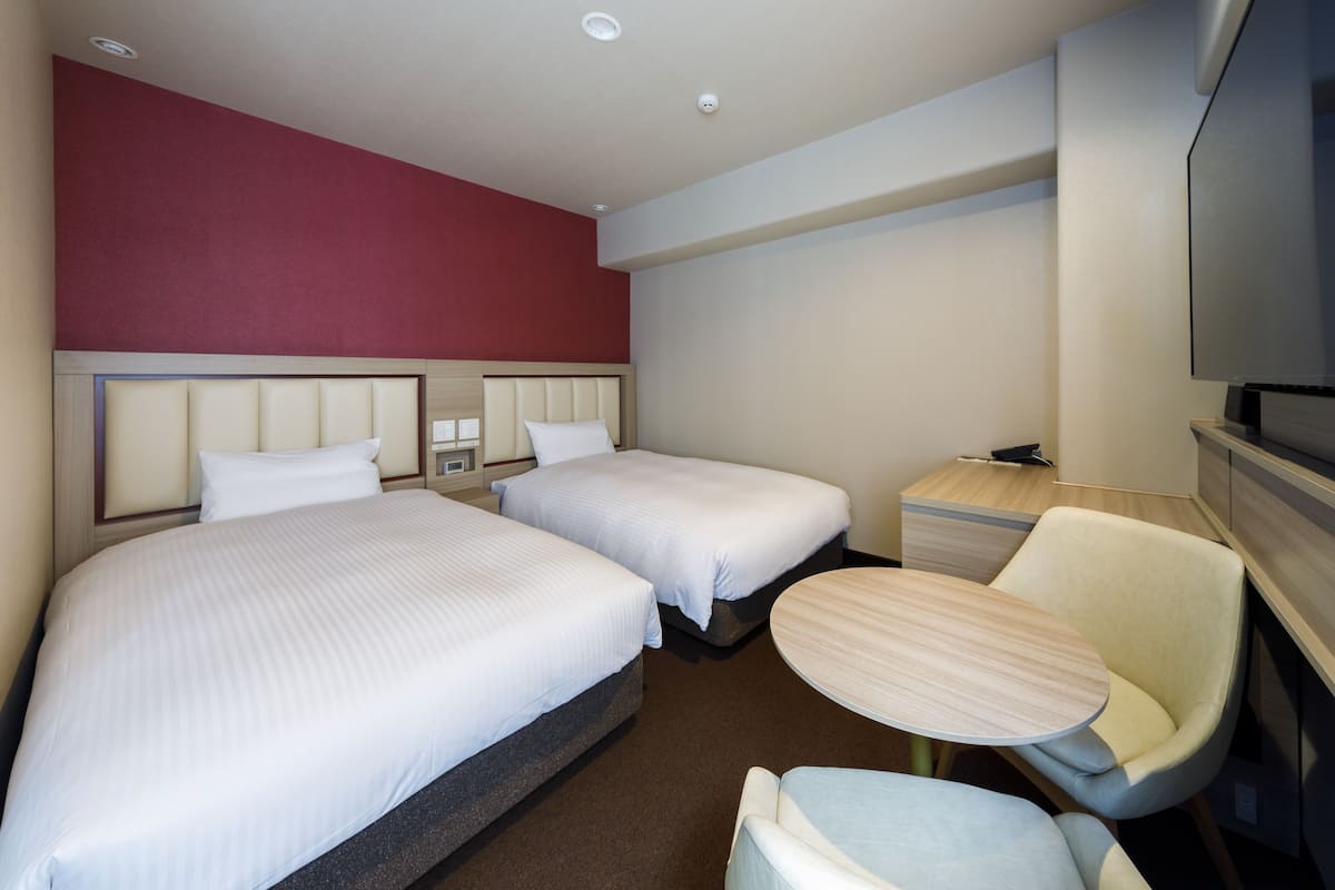 standard twin room | down duvets, in-room safe, iron/ironing board, free wifi