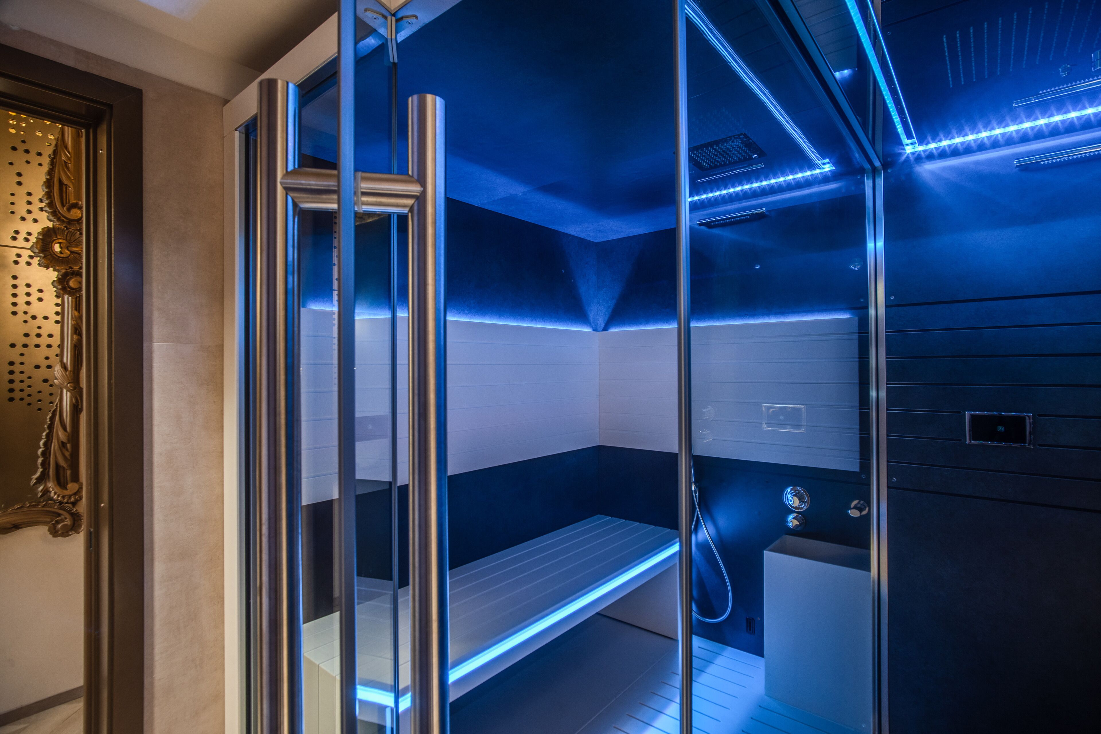 junior spa suite | bathroom | designer toiletries, hair dryer, bathrobes, slippers