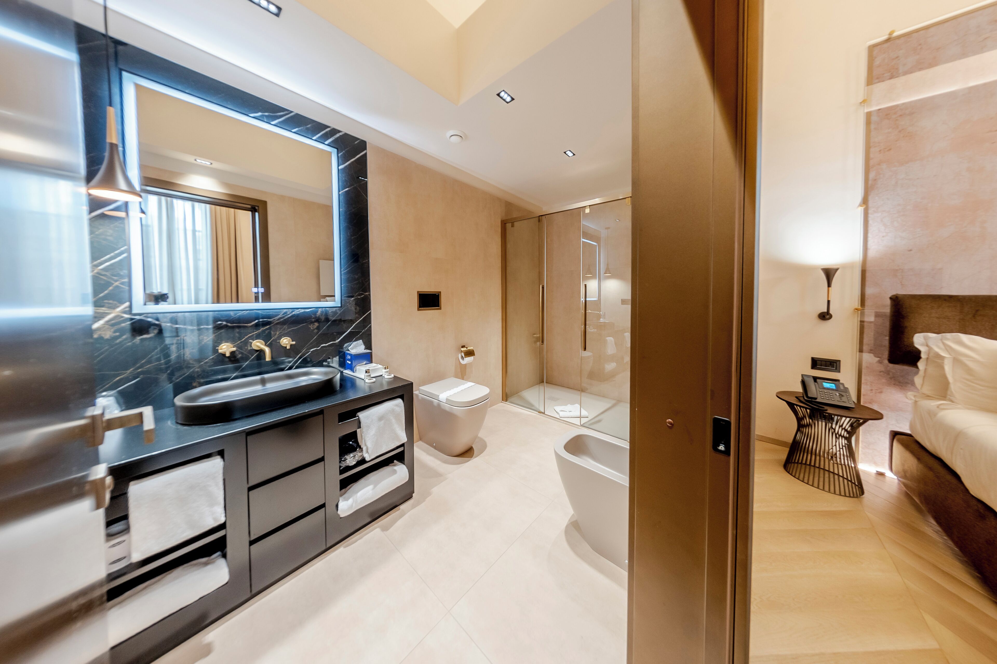 premium room | bathroom | designer toiletries, hair dryer, bathrobes, slippers